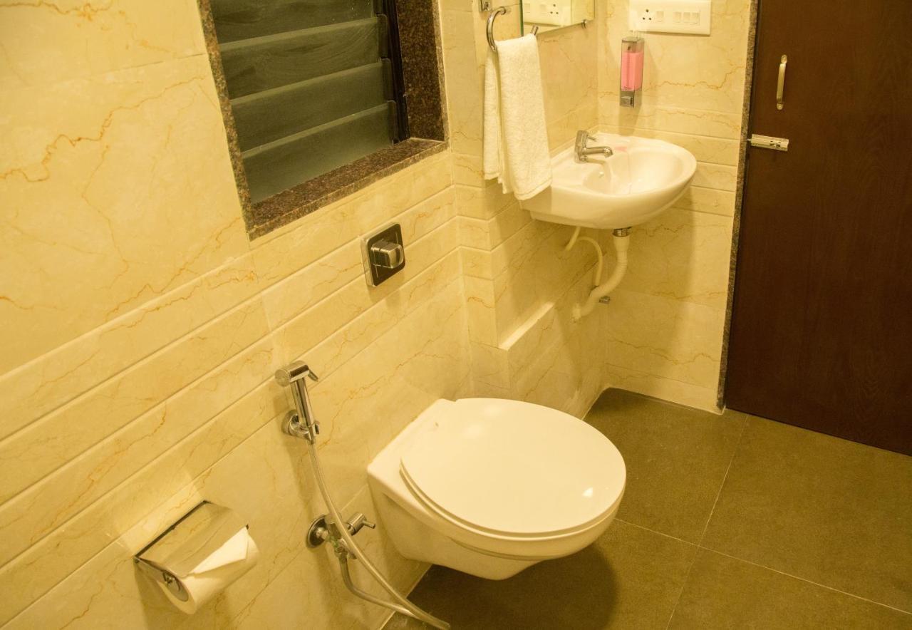 Hotel Nirvana Алібаґ Екстер'єр фото